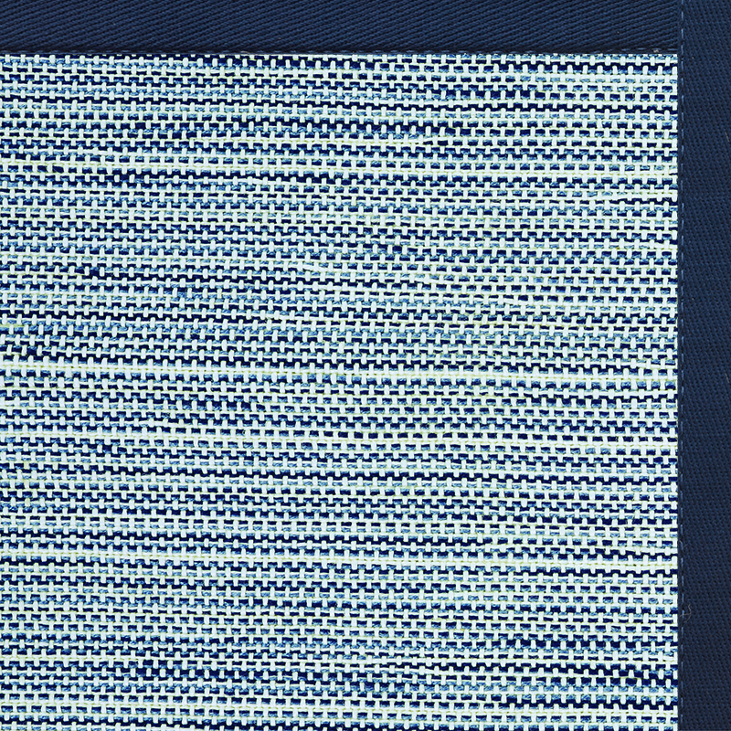 Close-up of a woven mat with horizontal navy blue and white stripes, bordered by a solid dark blue edge—perfect as one of those stylish beach house rugs that add a coastal touch to your space.
