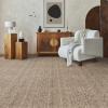 Duvall Wool Leather rug Cognac color in sitting room with white chair natural wood
