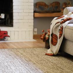 soft livingroom custom area rug with natural colors.