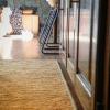 Hemp custom rug in luxury kitchen. Tan