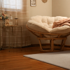 Marlis wool area and wall to wall rug. Room scene of gentle and soft girls reading room with cozy chair and soft rug.