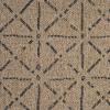 Beige woven rug with a geometric pattern of intersecting black lines forming diamond and star shapes, and a tightly stitched border on two sides—crafted in the style of indoor outdoor sisal rugs for versatile use.