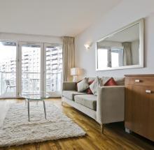 Apartment With a Large Mirror on the Wall