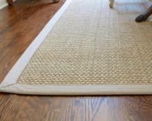 Seaside custom seagrass rug with matching border. Photo by Sheila Irwin