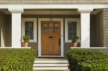 Front Porch Decorated With Potted Plants