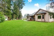 Home With a Dated Patio and Large Backyard