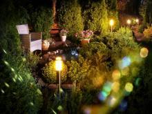 Outdoor Patio Illuminated By Floor Lamps