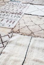Layering sisal rugs to achieve the desert explorer trend