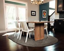 Dining Room With an Oval Jute Rug