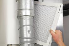 Replacing Air Filter to Prepare Home for Winter.