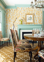 Dining Room With Patterned Chairs, Walls, and Rug
